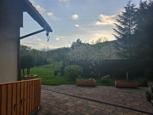 a view of a backyard with a basketball hoop at Noclegi Węgierska Górka in Węgierska Górka