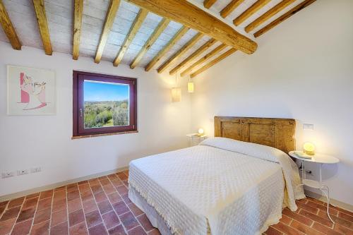 Ένα ή περισσότερα κρεβάτια σε δωμάτιο στο Villa Marielena Chianti hills view by Bestofmas