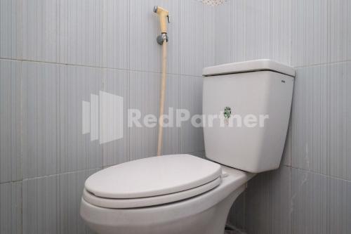 Ванная комната в Brilliant Homestay Dieng RedPartner