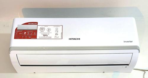 a white printer sitting on top of a table at Apto 2 quartos Inteiro privativo Palmas TO in Palmas