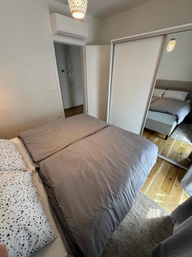 Ένα ή περισσότερα κρεβάτια σε δωμάτιο στο Apartment24