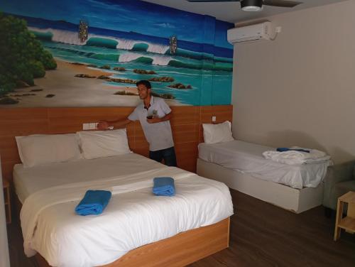 Postel nebo postele na pokoji v ubytování Seaview by Ukulhas