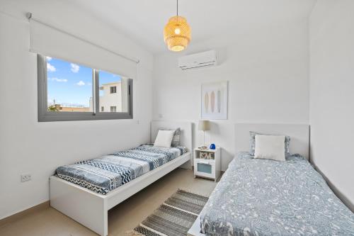 Ένα ή περισσότερα κρεβάτια σε δωμάτιο στο Kali Zoi Apartment