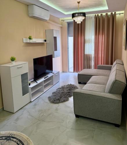 Гостиная зона в Ajan Alushani Apartment