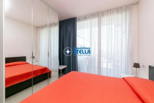 Postel nebo postele na pokoji v ubytování Condominio Mimose