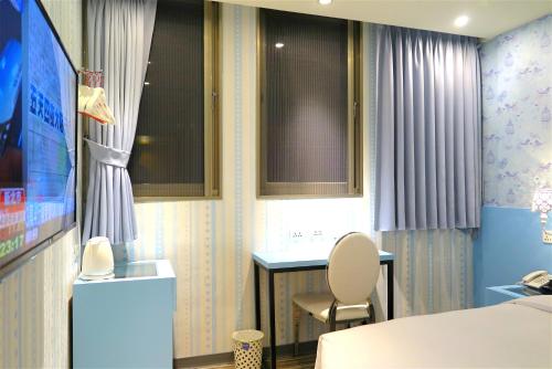 TV a/nebo společenská místnost v ubytování 191 Hotel