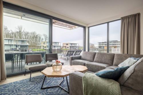 Χώρος καθιστικού στο Hello Zeeland - Veerse Wende - Lamsoor 7