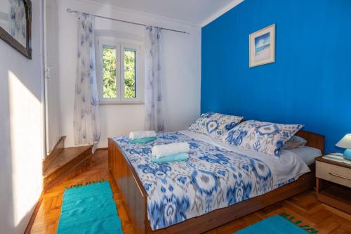 Postel nebo postele na pokoji v ubytování Villa Marija, a charming pet friendly Villa amidst nature