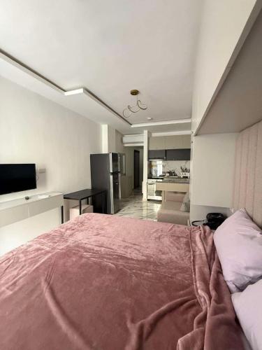 Postel nebo postele na pokoji v ubytování Orchid 40