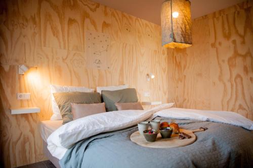 Postel nebo postele na pokoji v ubytování Ecohome Zilt - 8 pers - Zeezand Recreatie
