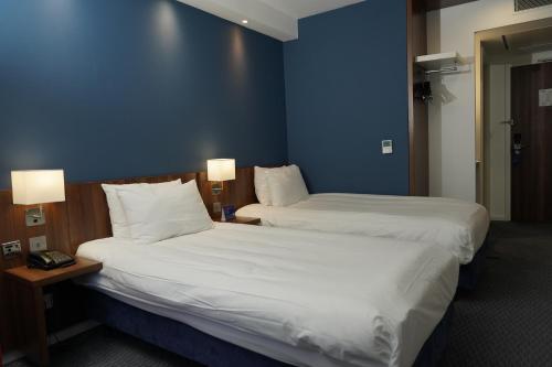 Postel nebo postele na pokoji v ubytování Holiday Inn Express Harlow by IHG
