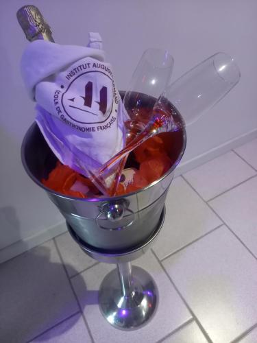 a cup with a bag of food in it at le cocon de gepetto spa privatif in Fussy