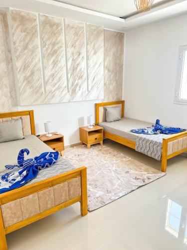 Villa Saba tesisinde bir odada yatak veya yataklar