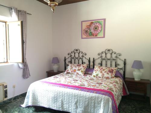 Llit o llits en una habitació de Alojamiento Rural Economato