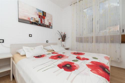 Posteľ alebo postele v izbe v ubytovaní Apartment JoviZ