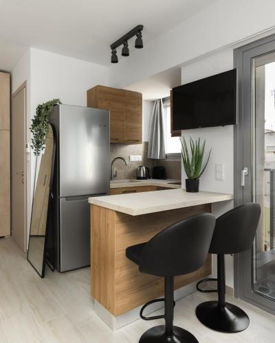 Η κουζίνα ή μικρή κουζίνα στο Babylon Luxury Suites No1 by BiNoBi!
