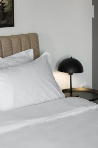 Ένα ή περισσότερα κρεβάτια σε δωμάτιο στο Babylon Luxury Suites No1 by BiNoBi!