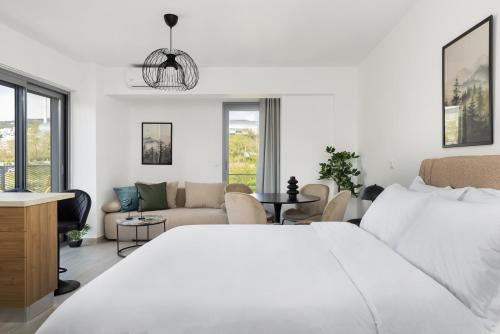 Ένα ή περισσότερα κρεβάτια σε δωμάτιο στο Babylon Luxury Suites No1 by BiNoBi!