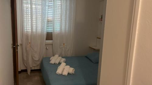 Postel nebo postele na pokoji v ubytování Hotel Villa Nicole