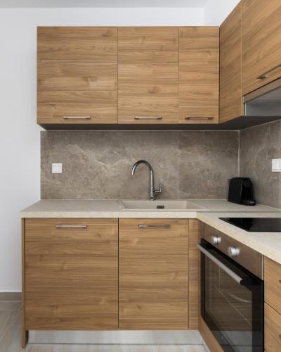 Η κουζίνα ή μικρή κουζίνα στο Babylon Luxury Suites No1 by BiNoBi!