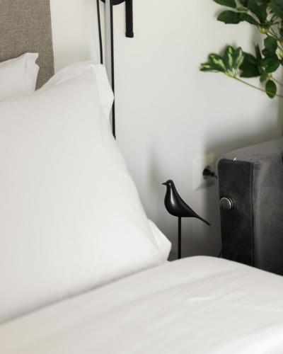 Ένα ή περισσότερα κρεβάτια σε δωμάτιο στο Babylon Luxury Suites No1 by BiNoBi!