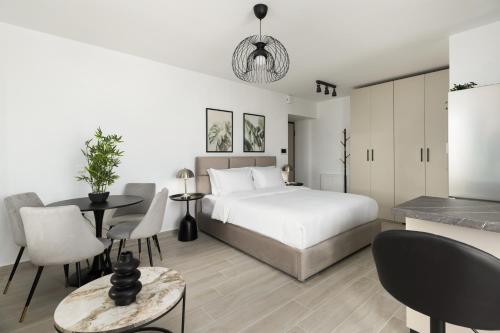 Ένα ή περισσότερα κρεβάτια σε δωμάτιο στο Babylon Luxury Suites No1 by BiNoBi!