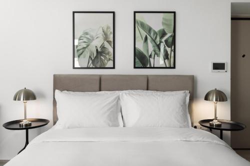 Ένα ή περισσότερα κρεβάτια σε δωμάτιο στο Babylon Luxury Suites No1 by BiNoBi!
