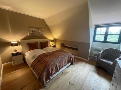 Ένα ή περισσότερα κρεβάτια σε δωμάτιο στο Lehrerhaus Hinterhaus - Ehlbeck