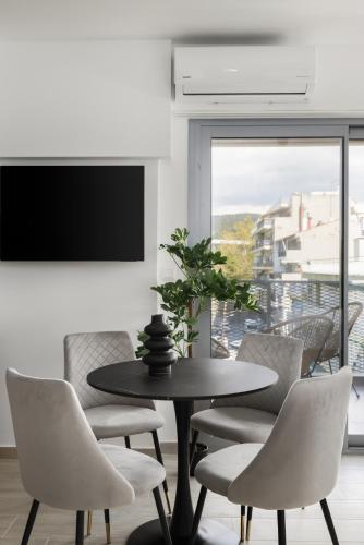Μια τηλεόραση ή/και κέντρο ψυχαγωγίας στο Babylon Luxury Suites No1 by BiNoBi!