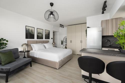 Ένα ή περισσότερα κρεβάτια σε δωμάτιο στο Babylon Luxury Suites No1 by BiNoBi!