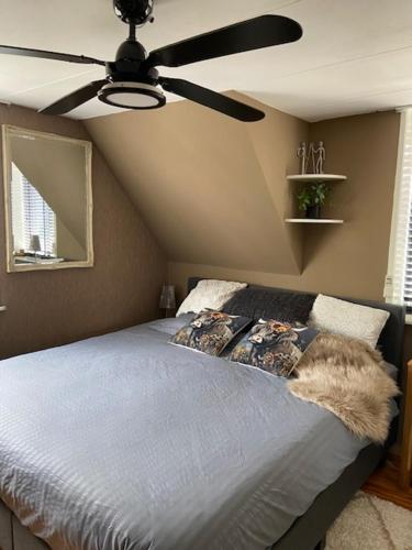 Cama o camas de una habitación en Tinyhouse Woody at the Water