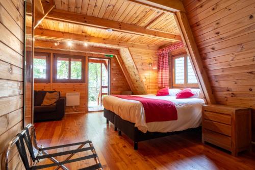 Postel nebo postele na pokoji v ubytování Hotel L'eau Vive