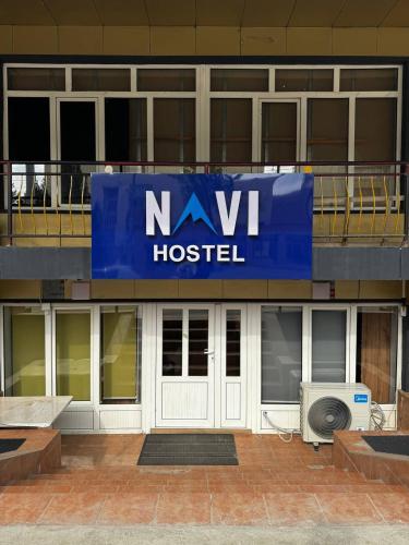 a nyu hospital sign on the side of a building at Hostel Navi Osh in Osh