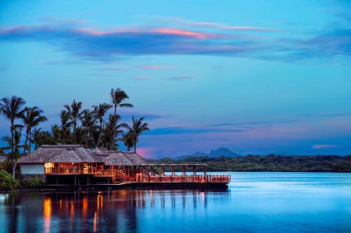 a resort on a island in the middle of the water at One&Only Le Saint Géran, Mauritius in Belle Mare