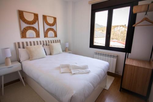 Katil atau katil-katil dalam bilik di Modern flat for Pyrenees Adventures - Free Parking