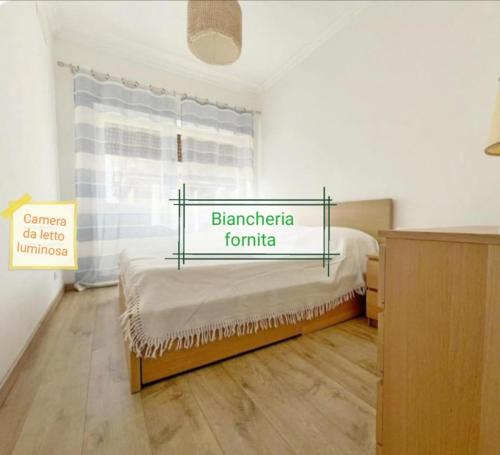 Ένα ή περισσότερα κρεβάτια σε δωμάτιο στο Vacanze romane