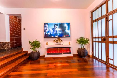 Light Villas Gigiriにあるテレビまたはエンターテインメントセンター