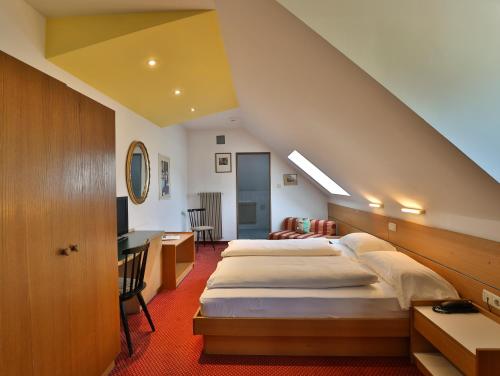 Postel nebo postele na pokoji v ubytování Hotel Sparerhof
