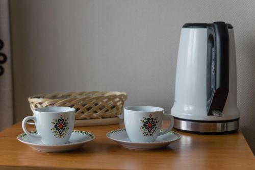 Příslušenství pro přípravu čaje a kávy v ubytování Pokoje Gościnne " W zasięgu Tatr"