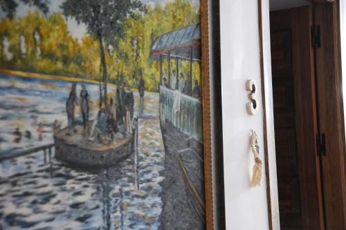 a picture of a painting of a train at Casa Rural El Gallo in Casas de Haro