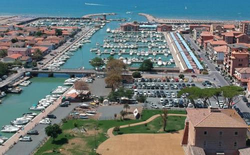 an aerial view of a marina with cars parked at Borgo Del Navigatore in Marina di Grosseto
