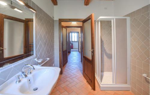 a bathroom with a sink and a walk in shower at Stunning Home In Spoleto in Spoleto