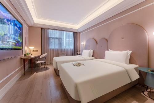 Mercure Shenzhen Nanshanにあるベッド
