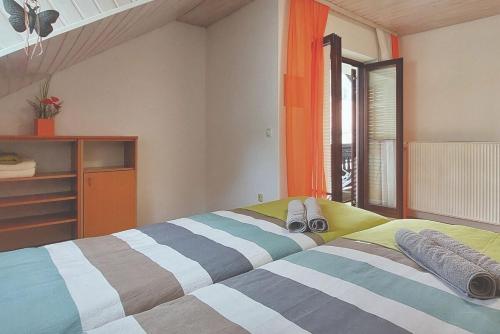 Ένα ή περισσότερα κρεβάτια σε δωμάτιο στο Apartment Erika