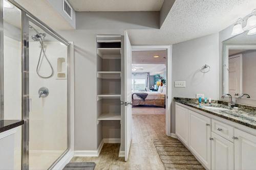 a bathroom with a shower and a sink at Yacht Club Villas 1-501 in Myrtle Beach
