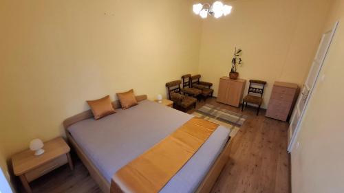 Postel nebo postele na pokoji v ubytování Piac Kuckó Apartman