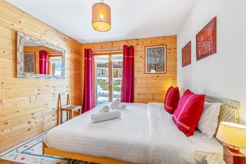 Postel nebo postele na pokoji v ubytování Chalet Magrappe, accès direct à la piste des Mayens de Veysonnaz