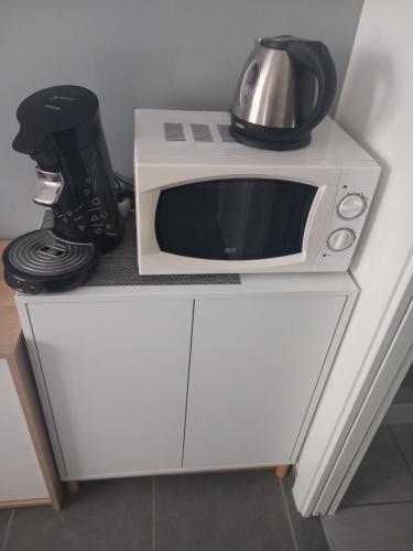 Η κουζίνα ή μικρή κουζίνα στο Chambre salle de bain clim
