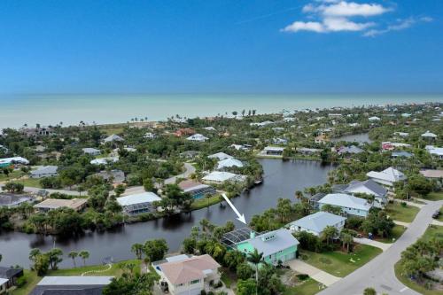 an aerial view of a town next to a body of water at The Turtle Nest in Sanibel