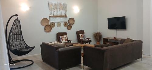 Et tv og/eller underholdning på Khaya Apartments Victoria Falls Estate